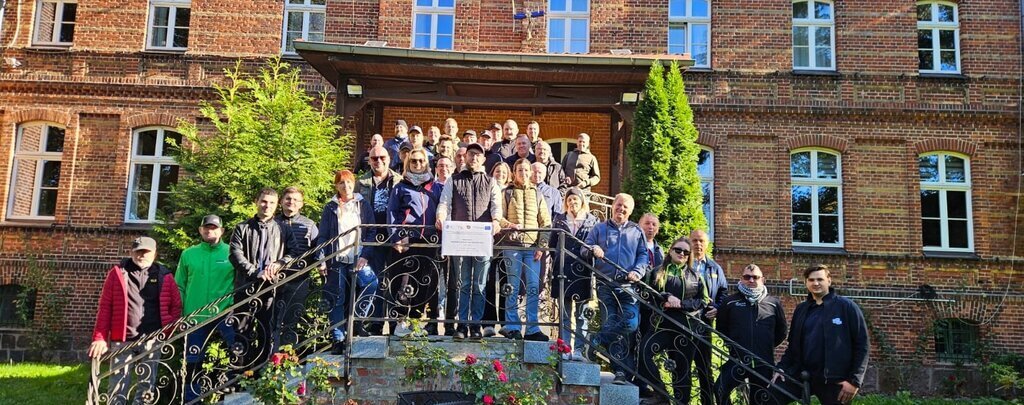 Obrazek przedstawia zdjęcie uczestników wydarzenia..