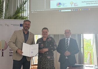 Zdjęcie przedstawia Przewodniczącą Komitetu, zastępcę dyrektora Departamentu Pomocy Technicznej i Instrumentów Finansowych oraz Zastępca Prezesa ARiMR