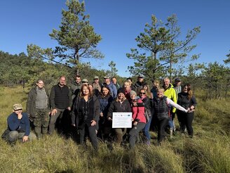 Obrazek przedstawia uczestników na szkoleniu terenowym na Polesiu